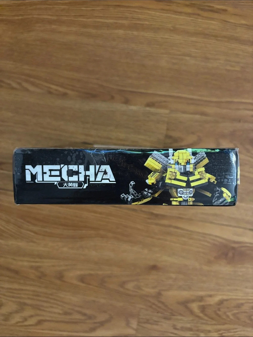 Transforming Black and Yellow 2-in-1 Robot and Vehicle Building Set.
